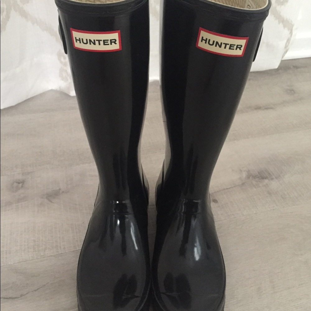Brand new short hunter rain boots US size 7 .